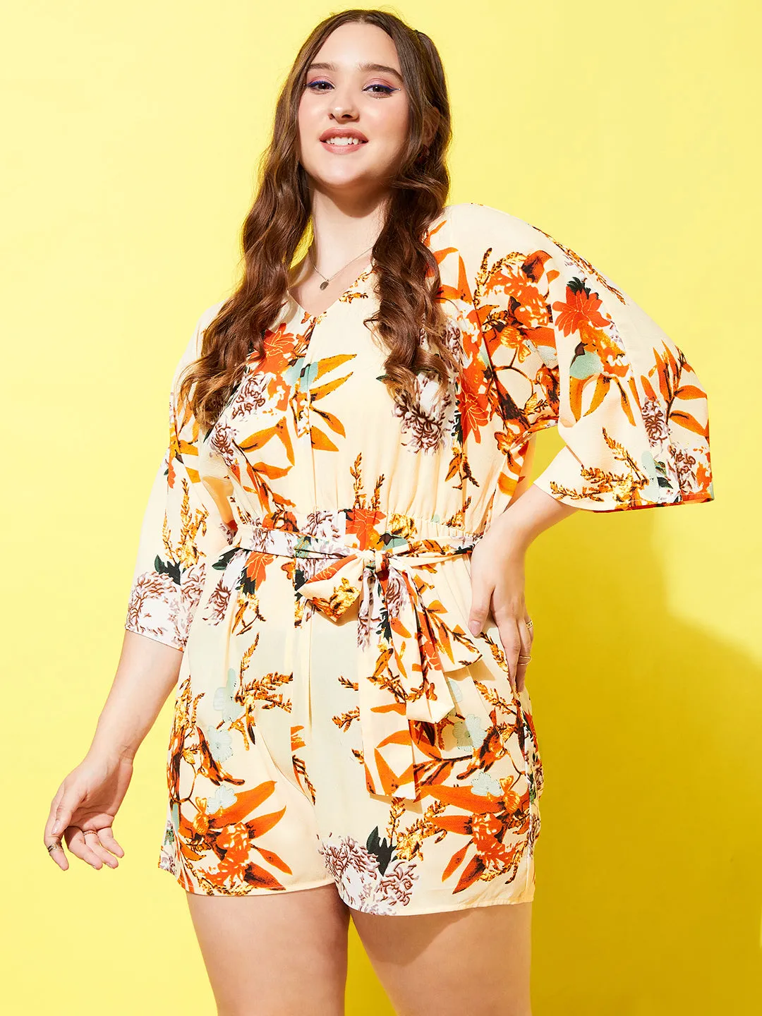 Berrylush Women Plus Size Beige & Orange Floral Printed V-Neck Three-Quarter Sleeve Waist Tie-Up Mini Jumpsuit